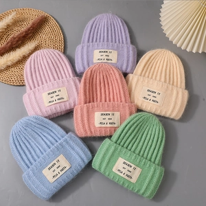 Winter rabbit hair knit beanie hats for women in six pastel colors with logo patch