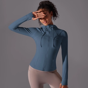 Close-up of navy blue zip-up sun protection hoodie with thumbholes and breathable fabric