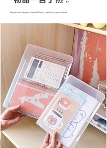 Close-up of hand holding a transparent A4 plastic file box with secure snap buckle design