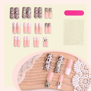 Handmade leopard print long press-on nails set with 3D charms and French tips