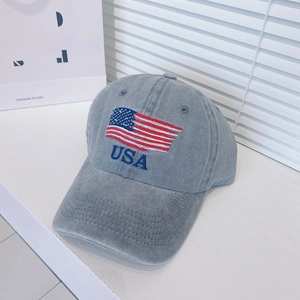Light grey washed cotton baseball cap with USA flag embroidery in a casual style