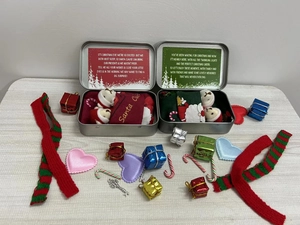 Christmas themed metal gift boxes with cute teddy bears and festive holiday decorations