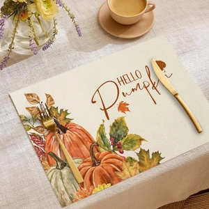Faux linen placemat featuring HELLO Pumpkin text and watercolor autumn harvest prints