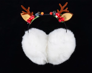 Detailed view of white plush earmuffs with festive brown reindeer antlers and red berries