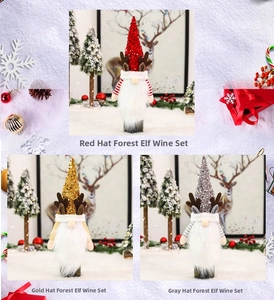 Detailed view of sequined gnome wine bottle covers with reindeer antlers in red, gold, and grey