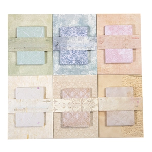 Textured embossed craft paper set for scrapbooking featuring six vintage earth tone colors