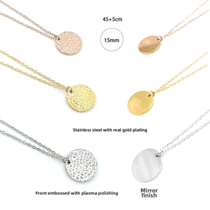 Detailed comparison of 15mm hammered and mirror finish stainless steel round pendants