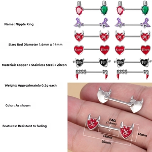 Macro view of 14G stainless steel nipple rings with devil heart and letter engravings