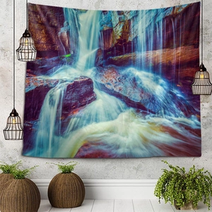 Detailed scenery tapestry with waterfall landscape displayed on a textured wall