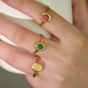 French luxury gold stainless steel open rings set with oval natural stones on hand