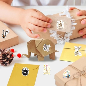 Music themed stickers featuring guitars and notes decorating gifts and envelopes