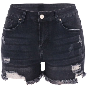 Detail view of distressed dark denim shorts with frayed hems and ripped texture