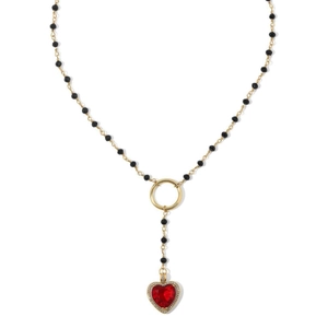 Elegant cherry heart zircon necklace with gold chain and black beads on white background