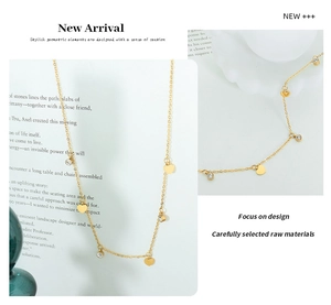 Detail of golden heart pendant necklace with zircon accents on a white decorative wave base