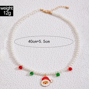 Detailed view of Santa Claus pendant pearl necklace with 40+5.5cm size markings