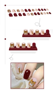 Detail view of cartoon tiger nail art set with red base and cute animal motifs