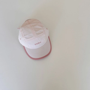 Detail view of pink 5-panel camper hat featuring white YIJIA embroidered lettering