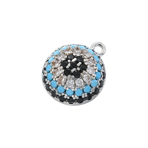 Macro view of evil eye pendant with sparkling turquoise and cubic zirconia inlays