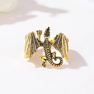 Vintage gold flying dragon ring with detailed scales and wings in retro oxidised style