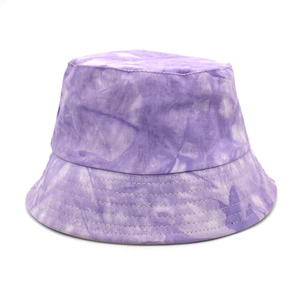 Detailed top view of a purple tie-dye reversible bucket hat in cotton twill fabric