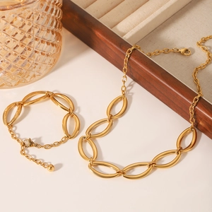 Set di collana e bracciale in acciaio inossidabile dorato con maglie ovali di lusso