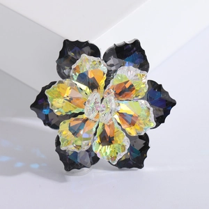Detailed close-up of luxury flower brooch featuring smoke-black and AB iridescent crystals