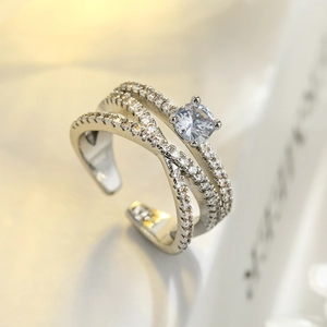 Silver plated geometric crossover open ring with pavé cubic zirconia accents