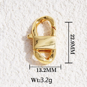 Macro detail of a 22.9mm gold lobster clasp with spring mechanism for DIY jewelry