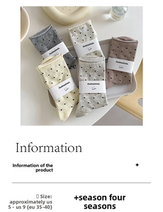 Detailed view of polka dot pattern cotton socks in various cream colors and packaging