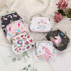 Variety of cute unicorn coin purses with rainbow prints and metal clasp on white knit