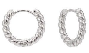 Macro detail of silver twisted rope textured C-shaped hoop earrings in metal finish