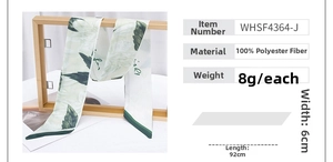 Close-up of 92x6cm leaf print polyester twilly scarf showing fabric weight and dimensions