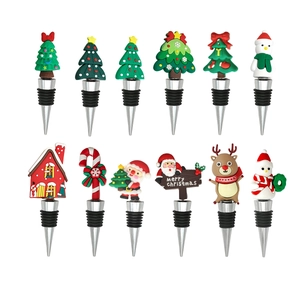 Set of 12 Christmas wine bottle stoppers featuring Santa, Snowman and reindeer designs
