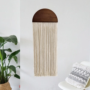 Handwoven macrame wall hanging with semi-circle wood board and long cotton fringe