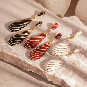 Vintage zebra stripe water drop earrings in black, red, and white enamel finish