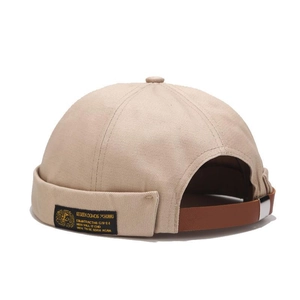 Khaki thin canvas docker cap with side label and adjustable leather strap on back
