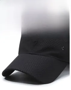 Detail of breathable laser-cut mesh fabric on a black baseball cap with 7 embroidery
