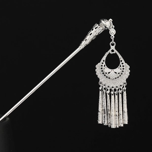 Traditional handmade silver Hmong hair pin with intricate filigree and hanging tassels