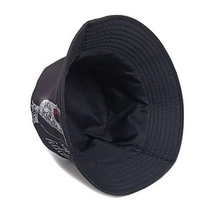 Detail of black cotton bucket hat featuring silver glitter Rock crown and skull prints