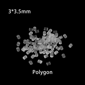 Macro detail of clear silicone polygon earring backings 3x3.5mm on black background