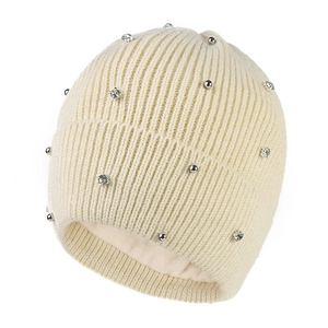 Detail view of rib-knit beanie with silver studs, rhinestones and thick fleece lining
