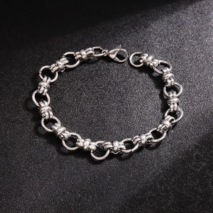 11mm titanium steel chain bracelet with lobster clasp on a black textured background