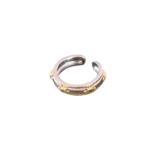 Vintage oval open ring in silver with gold embossed edges and green gemstones