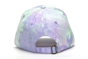 Detail view of colorful tie-dye baseball cap with shiny silver dust and metal buckle adjustment