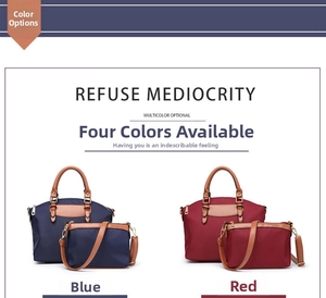 Detail view of navy and burgundy nylon tote sets with leather handles and gold hardware