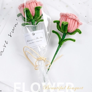 Elegant DIY pink pipe cleaner rose bouquet with green leaves in premium gift wrapping