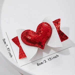 Pink heart bow hair clip with glitter detail and dimensions 8cm by 5cm on white background