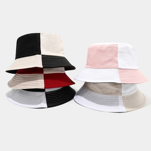 Stylish two-tone patchwork cotton bucket hats in various colors for outdoor sun protection