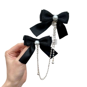 Elegant pair of black bow hair clips with pearl tassel chains for girls and women