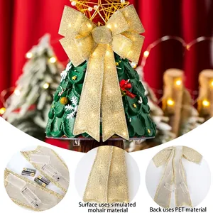 Large golden LED lighted Christmas bow for tree topper with glitter texture finish